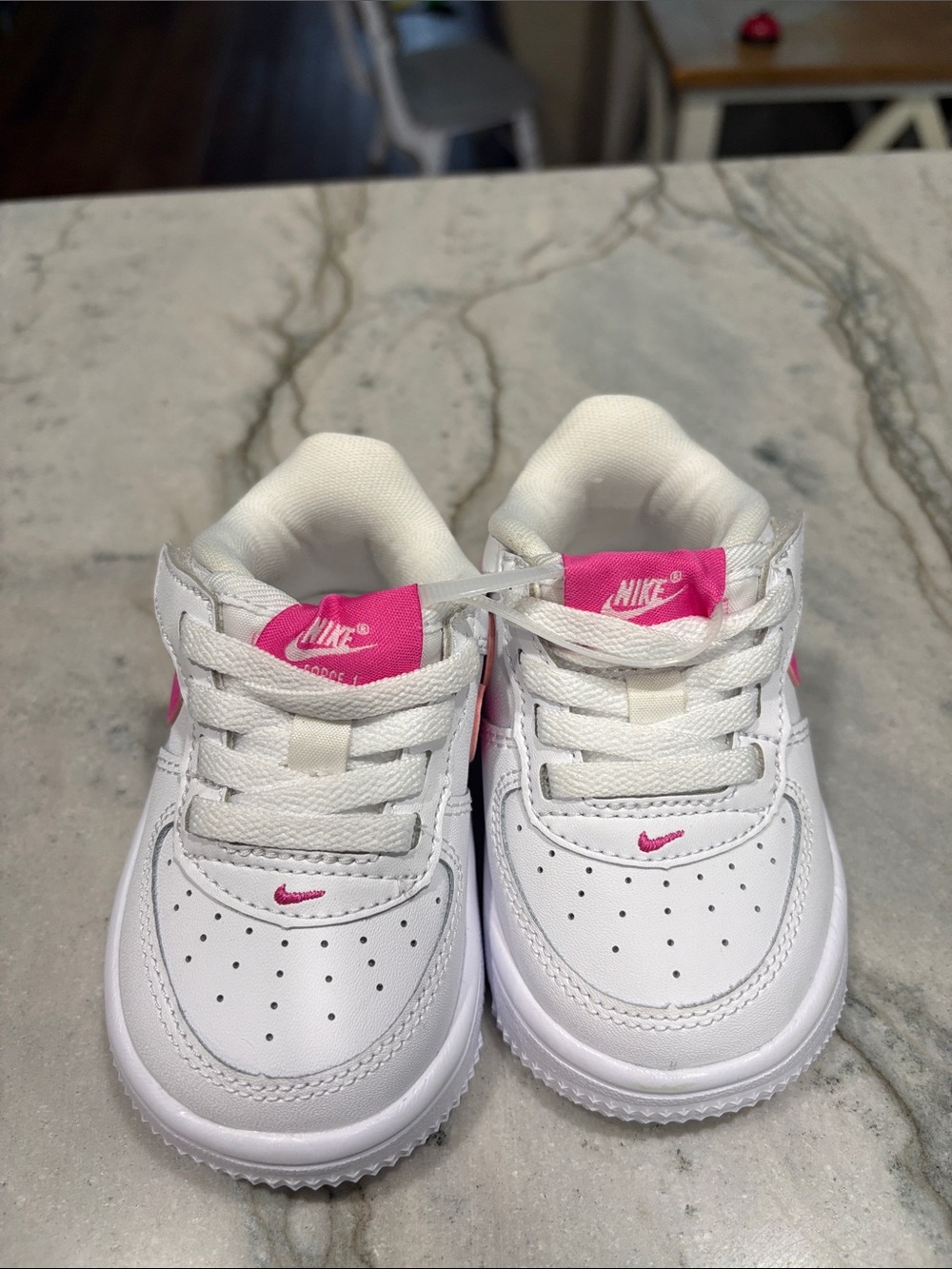 Nike Kids White Sneakers with Pink Accent